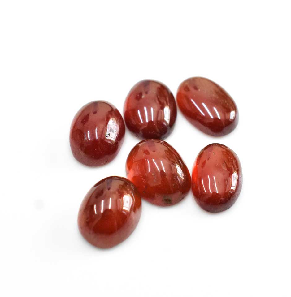 oval_cut_hessonite_cabochons_right_1664257361